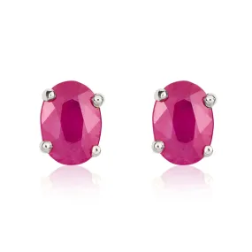 9ct White Gold Ruby 7x5mm Oval Claw Set Stud Earrings