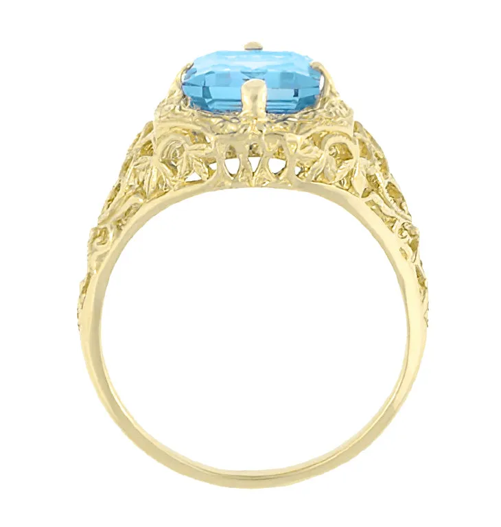 Art Deco Flowers and Leaves Swiss Blue Topaz Filigree Ring in 14 Karat Yellow Gold - December Birthstone