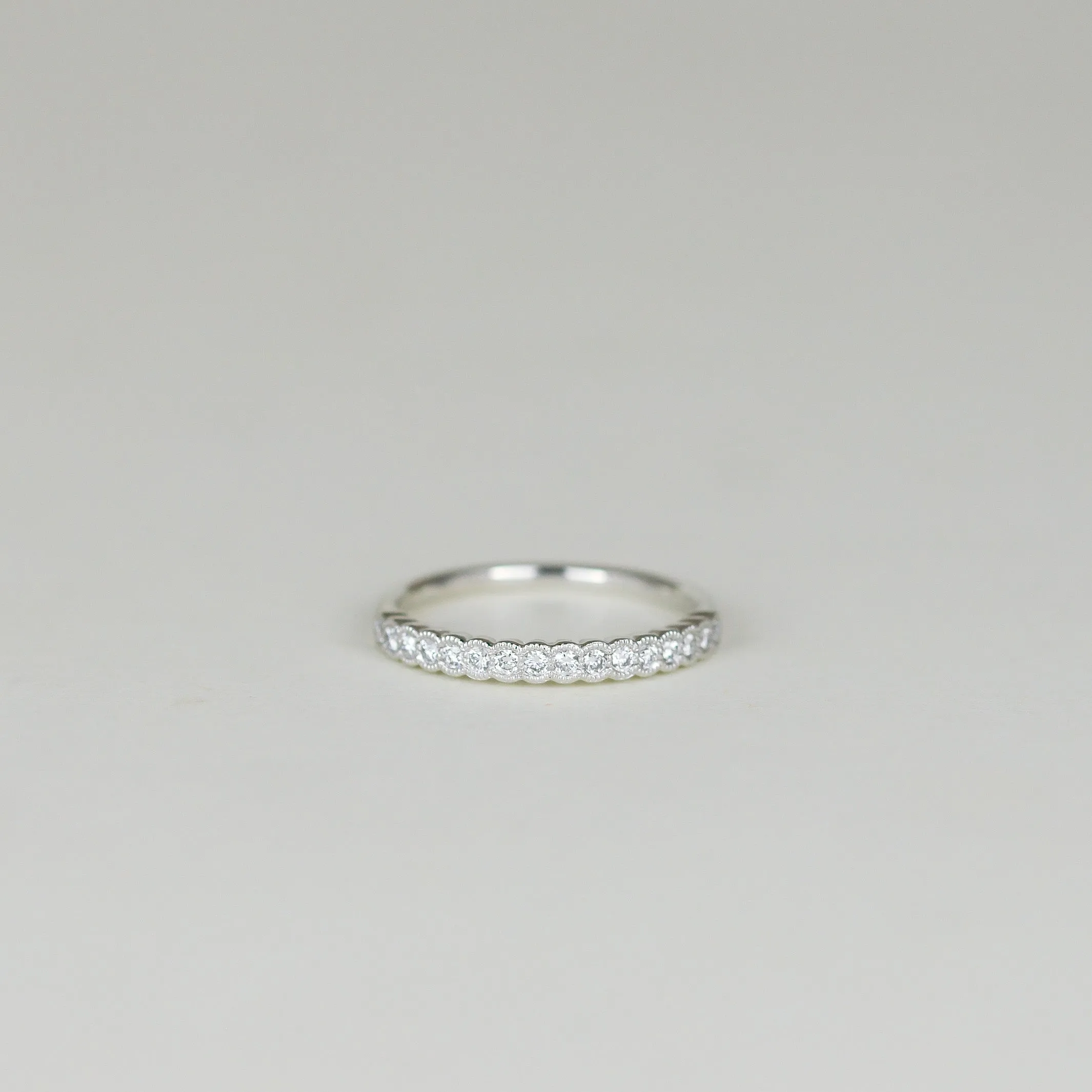 Platinum 0.20ct Round Brilliant Diamond Scalloped Edge Half Eternity Ring